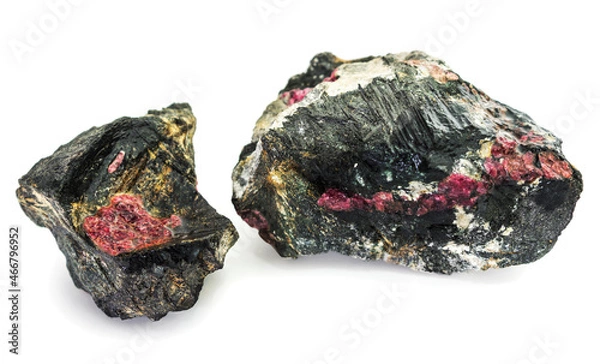 Fototapeta Two pieces of rock interspersed with the mineral eudialyte on a white background