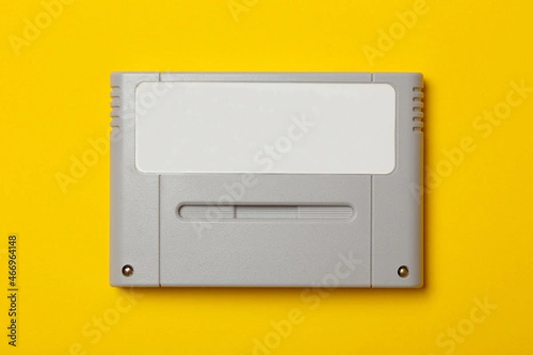 Obraz a retro game cartridge with blank label