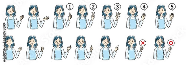 Fototapeta エプロン姿成人女性指差しバストアップ