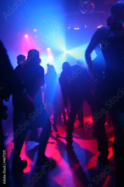 Fototapeta Dancing people in an underground club