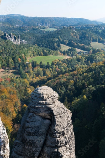 Fototapeta Round rock on the background of a deep canyon in Germany