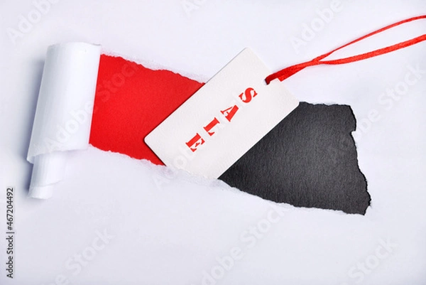 Obraz label on a black and red background