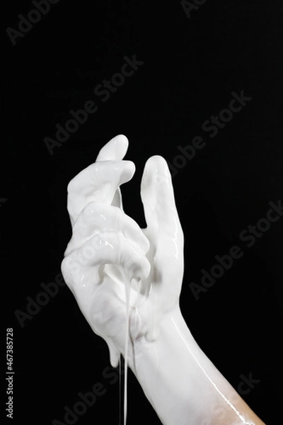 Obraz an open palm with a flowing liquid