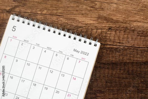 Fototapeta Top view calendar desk 2022, Calendar planning in May month on wooden table background.