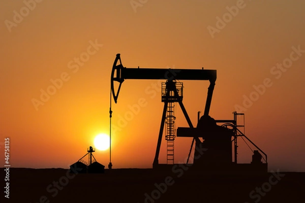 Obraz isolated oil pump at sunset