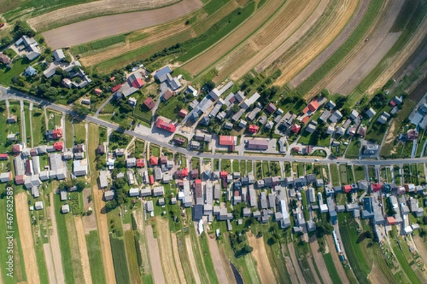 Fototapeta Village, amazing in Poland from a bird's eye view from a drone. Sułoszowa - the longest village from the drone.
