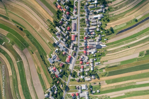 Fototapeta Village, amazing in Poland from a bird's eye view from a drone. Sułoszowa - the longest village from the drone.