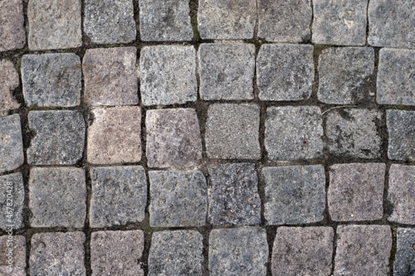 Fototapeta Texture of stone, granite, marble, rustic cobblestones, used for construction or for the elaboration of decorative floors, being very durable over time
