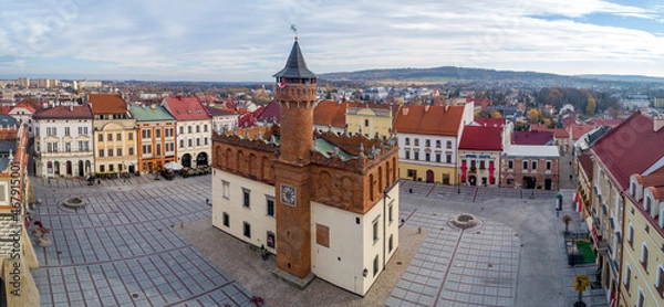 Fototapeta Tarnow, Poland. Old town main square, often called "Pearl of Polish Renaissance” with a mannerist late renaissance town hall with an attic and renaissance tenement houses. Aerial panorama