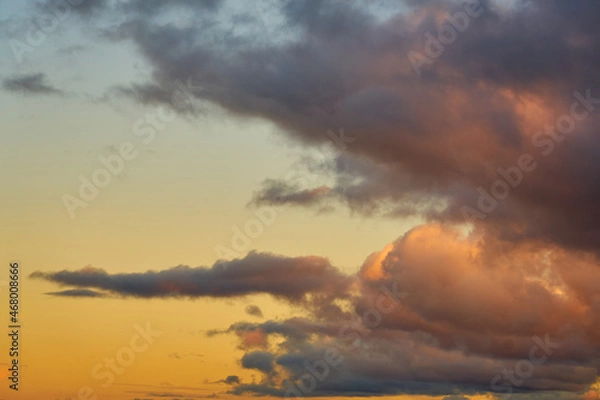 Fototapeta Colorful clouds in the setting sky as a background.