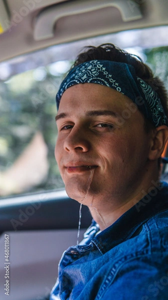 Fototapeta man drooling water from his mouth