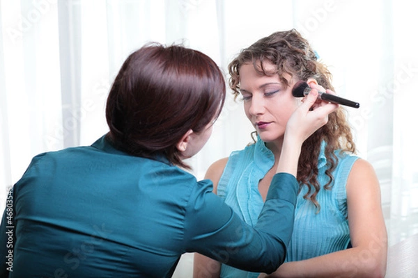 Obraz Pretty young female model having her makeup.