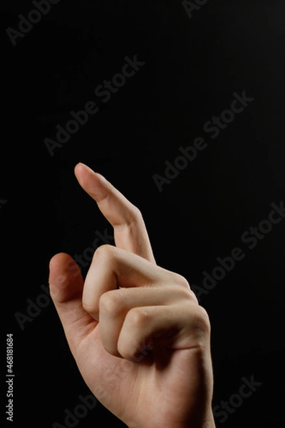 Obraz the index finger points up