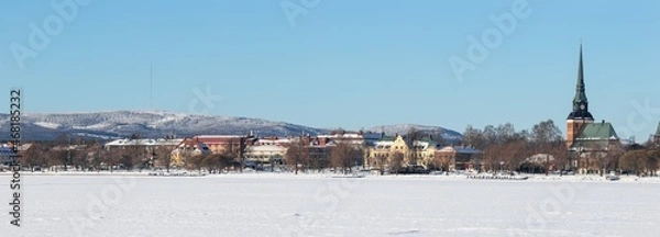 Obraz panorama of a small town in winter in the snow, in Mora (Dalarna) Sweden
