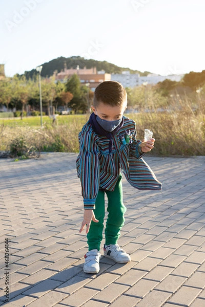 Fototapeta Boy launching firecrackers known as Bombetas in Valencian fallas festivals