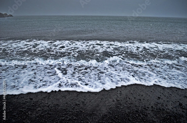 Obraz black beach and waves on a cloudy day, Lóndrangar, Iceland