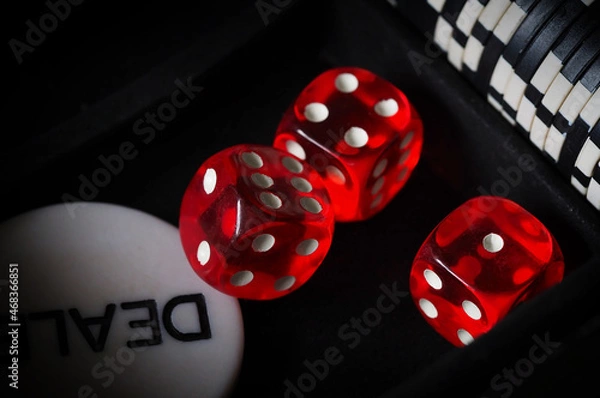 Fototapeta red playing dice, poker plastic chips, close-up, macrophotography, selective focus, blurry background, risk concept, stock exchange game, casino, gambling, gambling, excitement