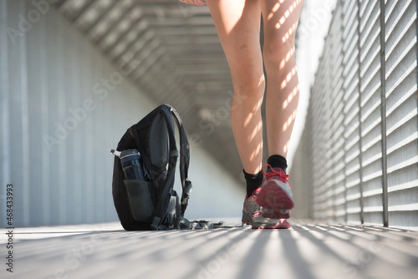 Fototapeta Walking in Memphis Tennesee. Close up view of woman's legs walking