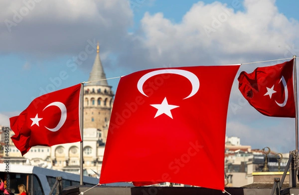Fototapeta The Galata tower and the old quarters of Istanbul on the background of blue sky.  Tourist destination Istanbul Turkey