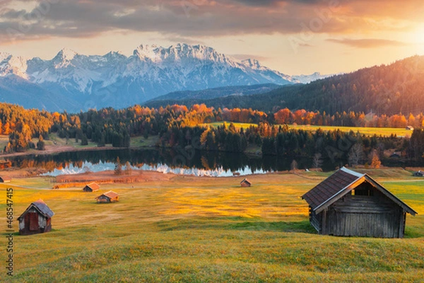 Obraz Amazing mountain pond on the Geroldsee lake (Wagenbrüchsee), in the background overlooking the Alpspitz and Zugspitz mountains at sunset, Garmisch-Partenkirchen, Bavaria