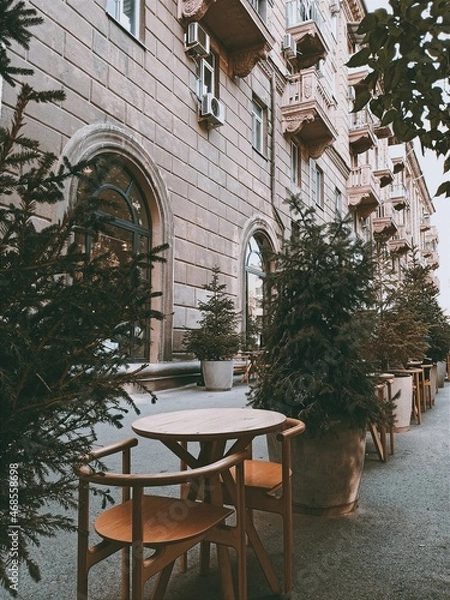 Obraz table and chairs on the street