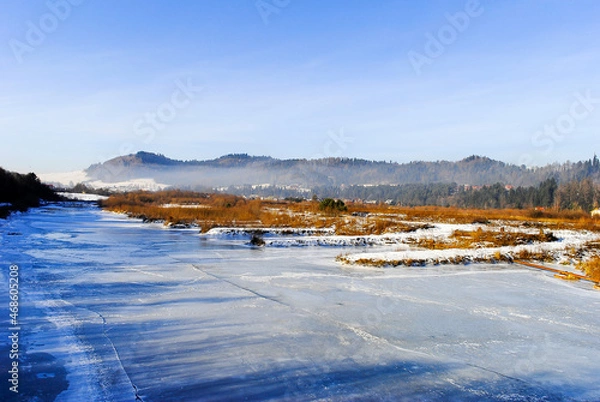Obraz A frozen river on a sunny day, Pieniny, Poland
