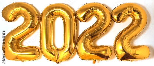 Fototapeta Figures 2022 made of gold foil balloons. White minimalistic background. Signs and symbols of the new year.
