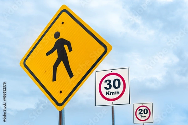 Obraz different road signs posted one after another on the same road