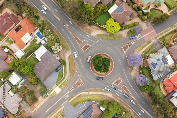 Obraz Top down aerial view of cars on a roundabout in suburban Sydney, Australia.