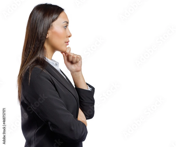 Fototapeta Profile view of young mixed ethnicity businesswoman thinking isolated against white background with copy space