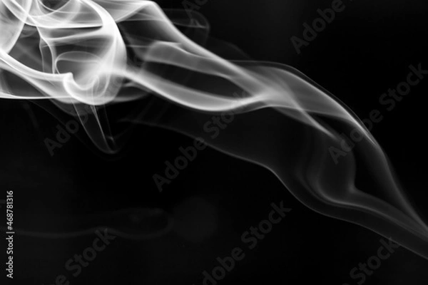 Obraz White  smoke motion on black background.