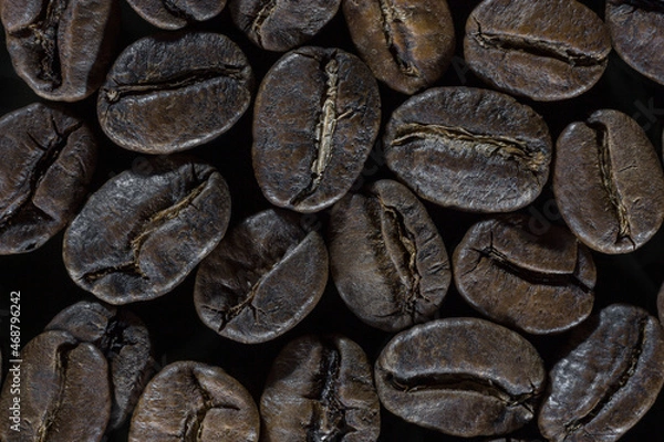 Fototapeta Close-up of roasted coffee beans, vigorous and productive mood concept
