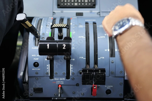Obraz Pilot in the cockpit of a plane