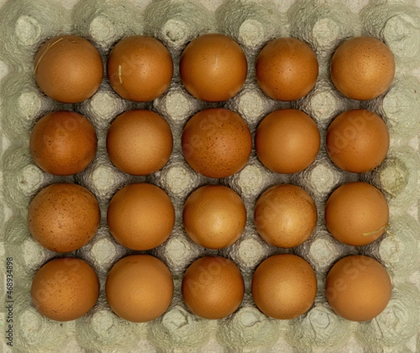 Obraz Egg background. Eggs in a carton box