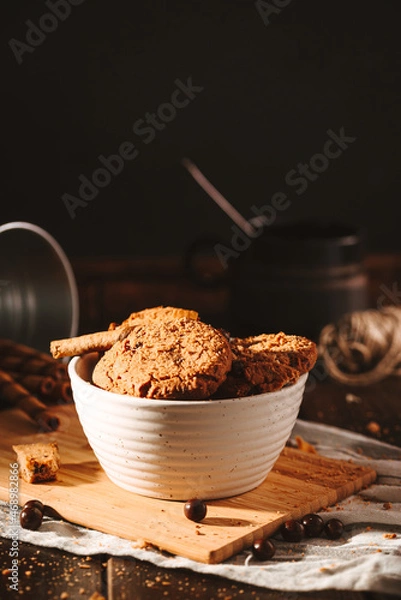 Obraz Chocolate cookies on dark background 