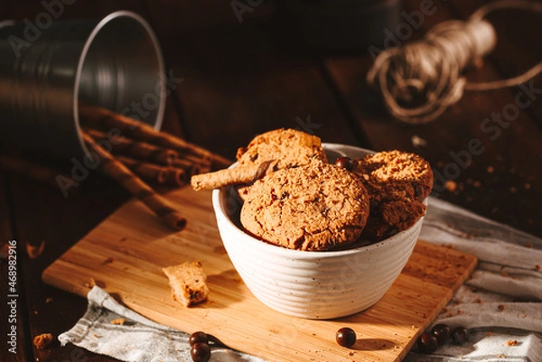 Obraz Chocolate cookies on dark background 