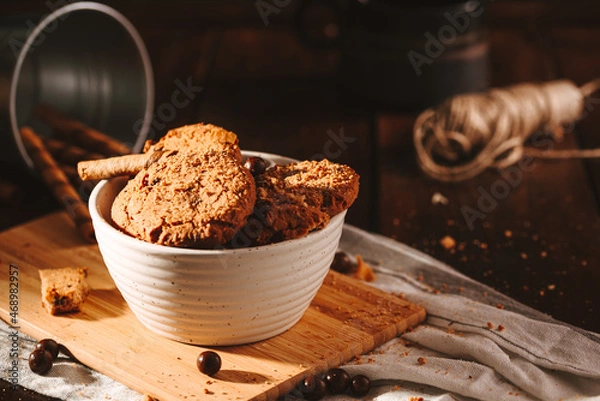 Obraz Chocolate cookies on dark background 
