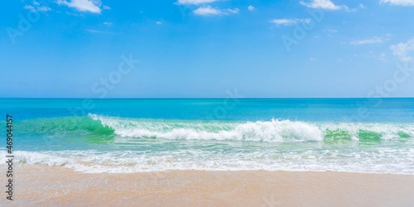 Fototapeta Blue-green wave on ocean beach in Florida in spring. Panoramic photo