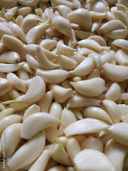 Fototapeta heap of peeled garlic cloves, Peeled garlic cloves. 4K