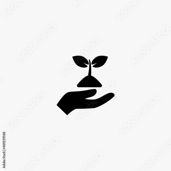 Fototapeta hand holding up a sprout icon. hand holding up a sprout vector icon on white background