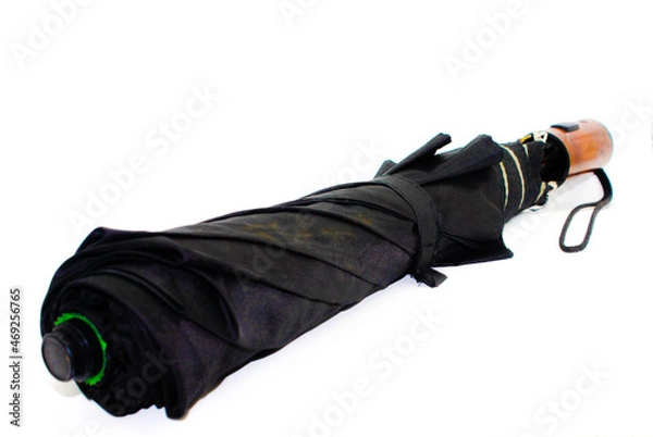 Fototapeta Umbrella on white background with selective focus
