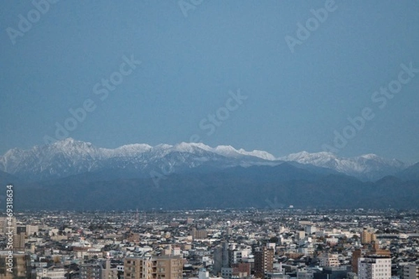 Obraz 都会から見た山脈