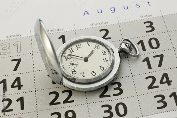 Fototapeta Clock and a calendar