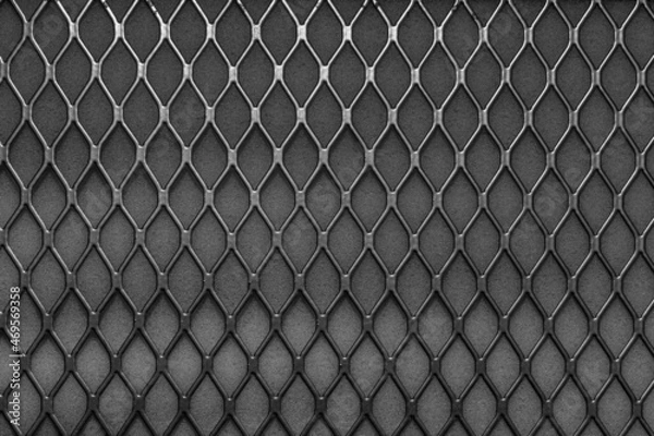 Obraz Metal grid with geometric pattern of rhombi, background. Black metallic modern background