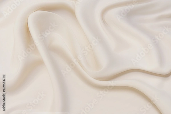 Fototapeta Abstract background texture of natural light color fabric. Fabric texture of natural cotton or linen, silk or satin, wool or jersey textile material. Luxurious white canvas background.