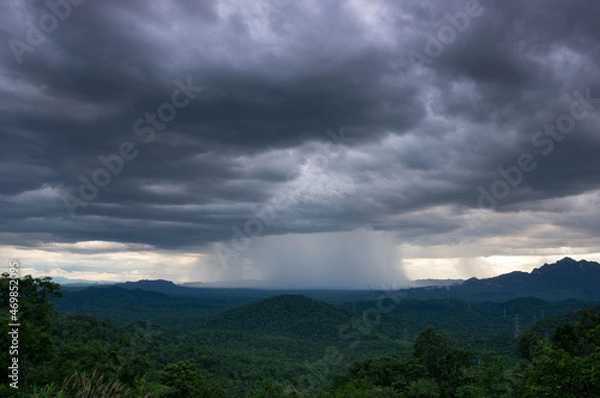 Fototapeta Nature environment Dark sky Big clouds Black moving storm clouds Thunderstorms on the horizon Time lapse Giant storms Fast moving Movie time Mea Mo, Lam pang Thailand.
