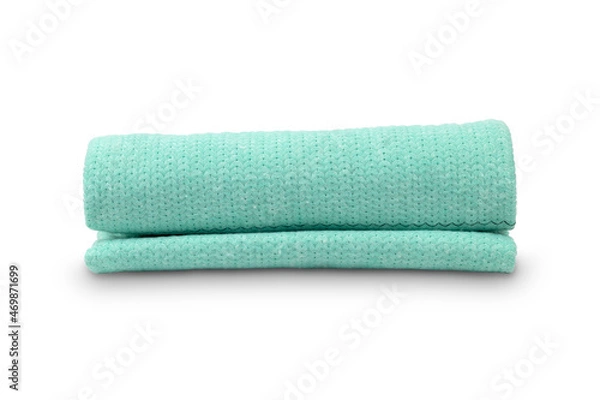 Fototapeta blue towel rolled up in a tube, white background