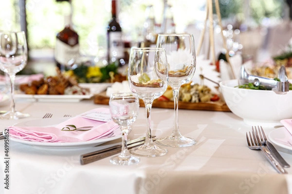 Fototapeta Table setting for an event party or wedding in the restaurant decorated 