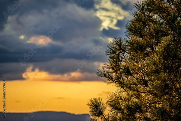 Fototapeta clouds sunset over the city