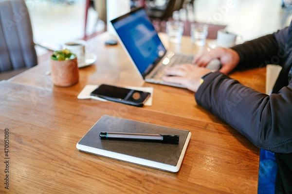 Fototapeta person working with computer.